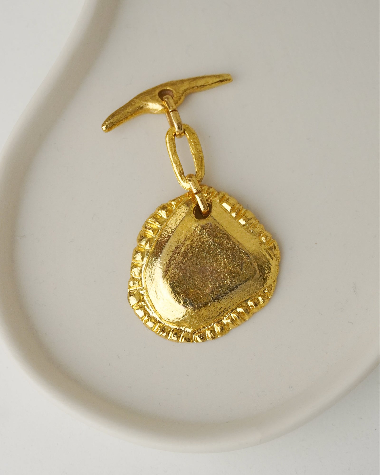 Dije Metal Dorado