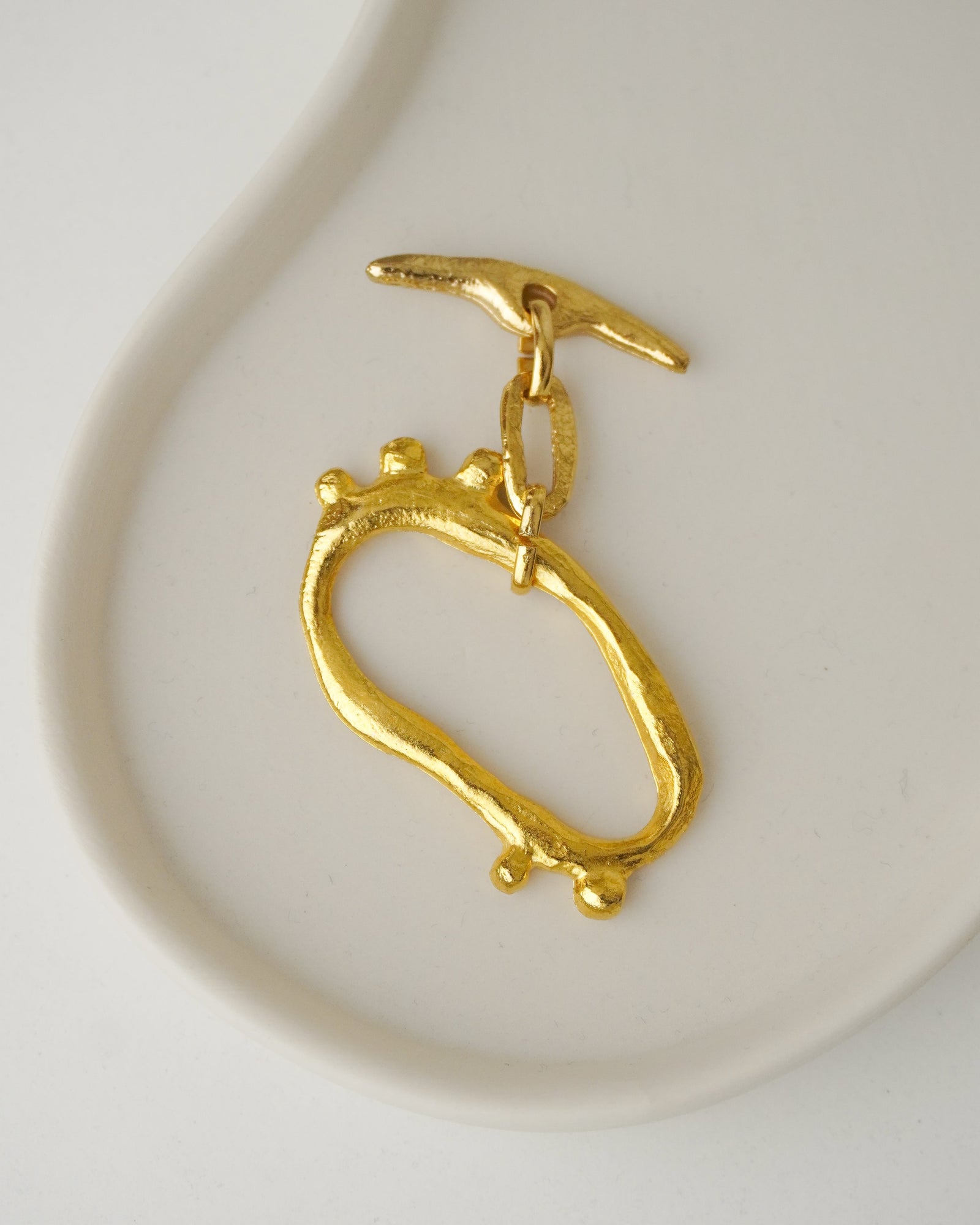 Dije Metal Dorado