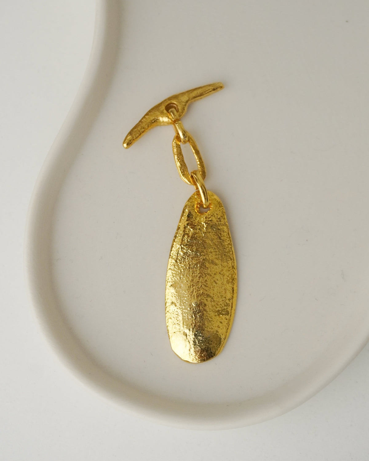 Dije Metal Dorado