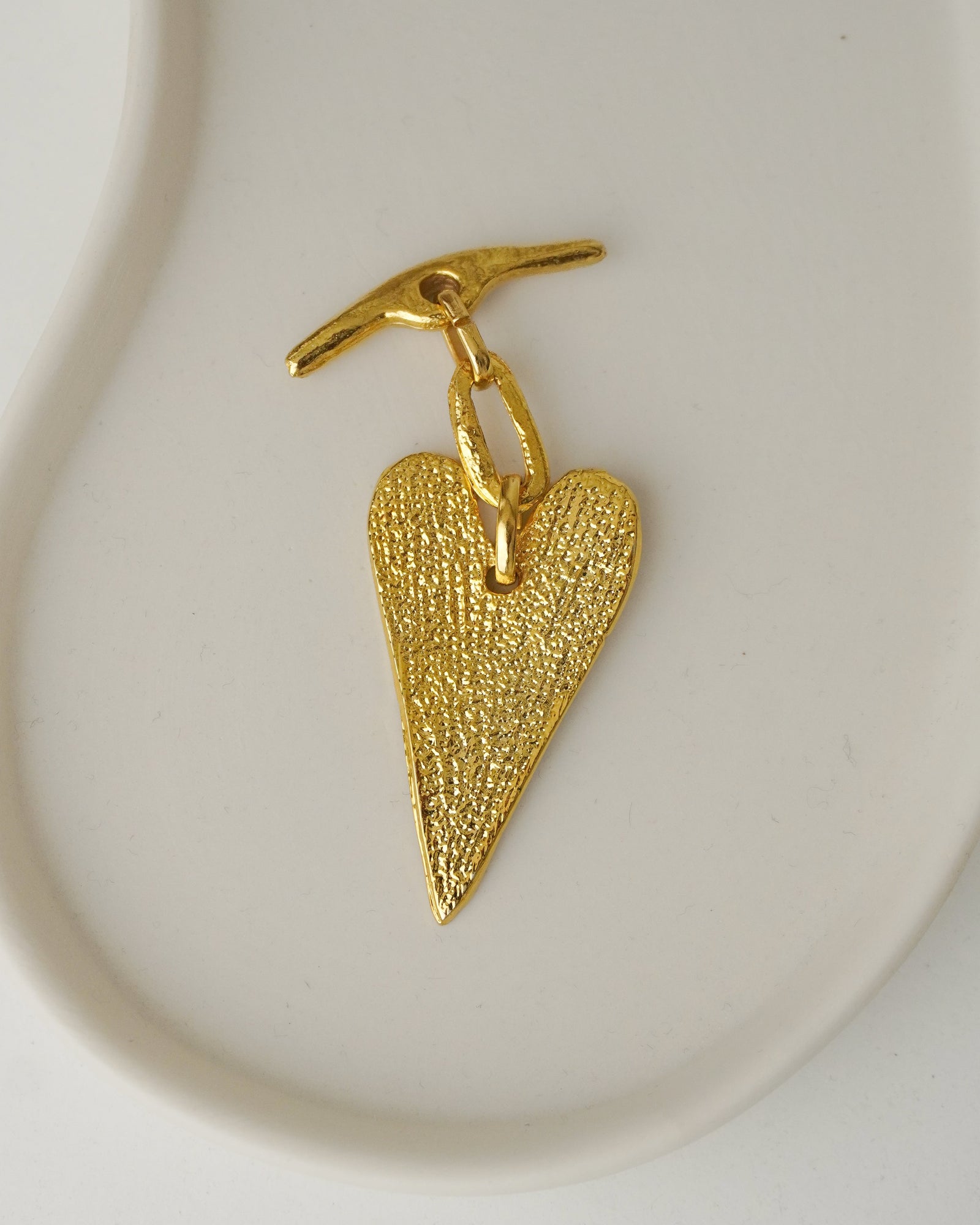 Dije Metal Dorado