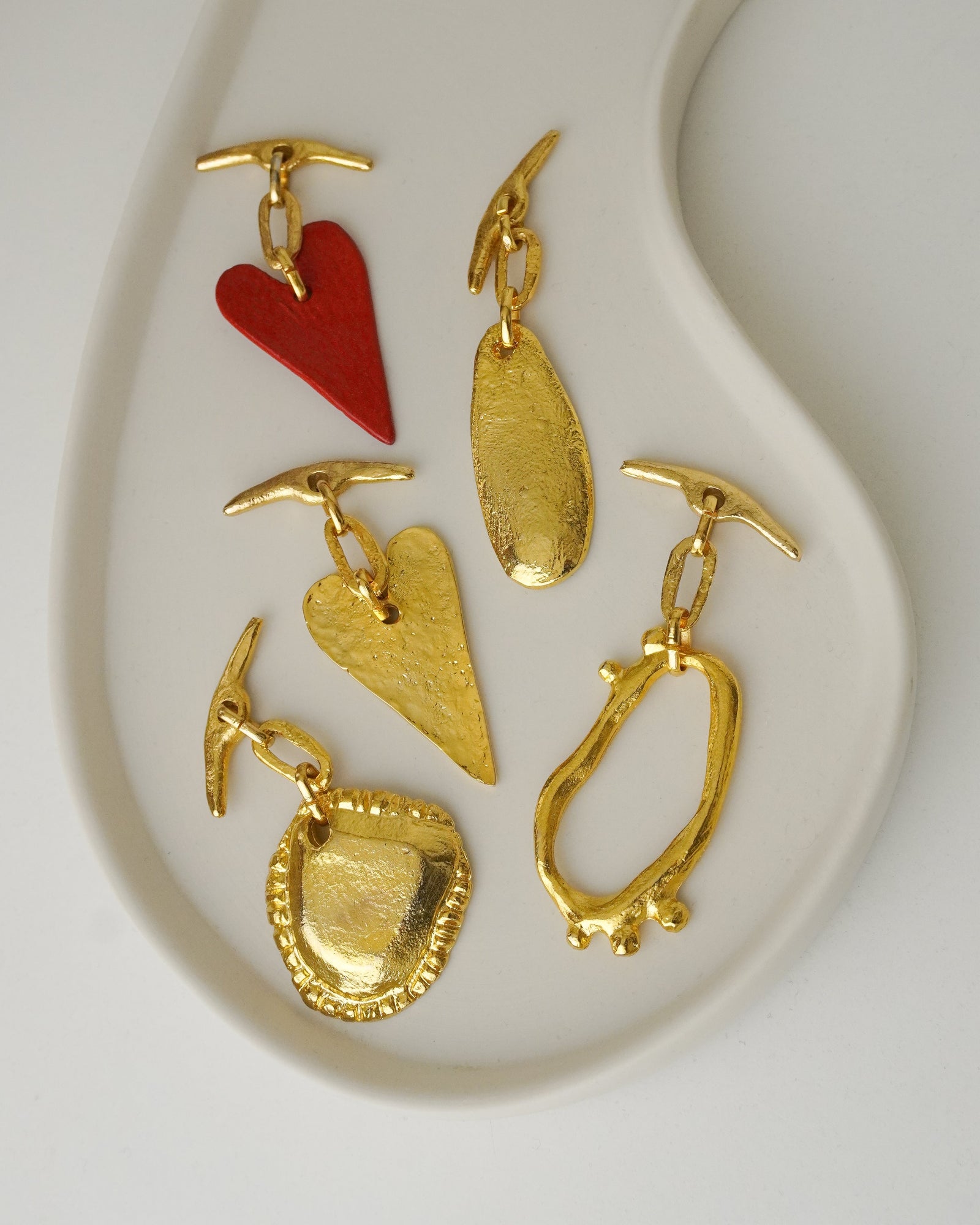 Dije Metal Dorado